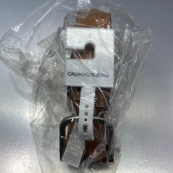 Calvin Klein Accessories - BNWT Calvin Klein Jeans Woman’s Tan leather color Small